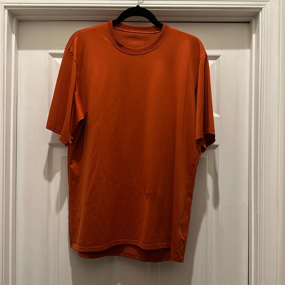 Men’s burnt orange Patagonia shirt. Excellent condition
